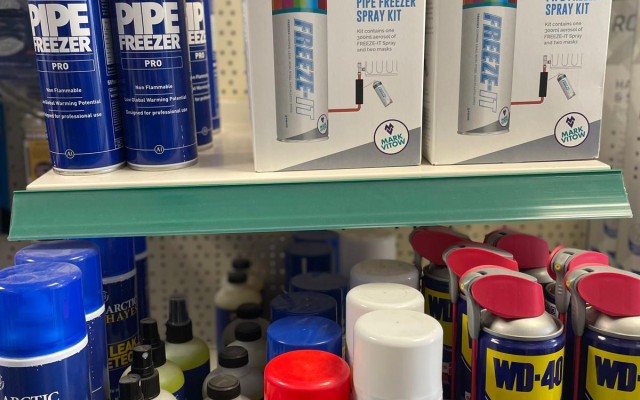 Mark Vitow at HPC Plumbing Supplies showcasing a variety of plumbing products.